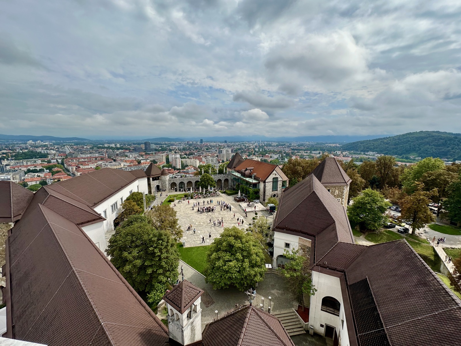 Ljubljana Castle offers stunning views of Slovenia's vibrant capital cityscape and lush greenery below.