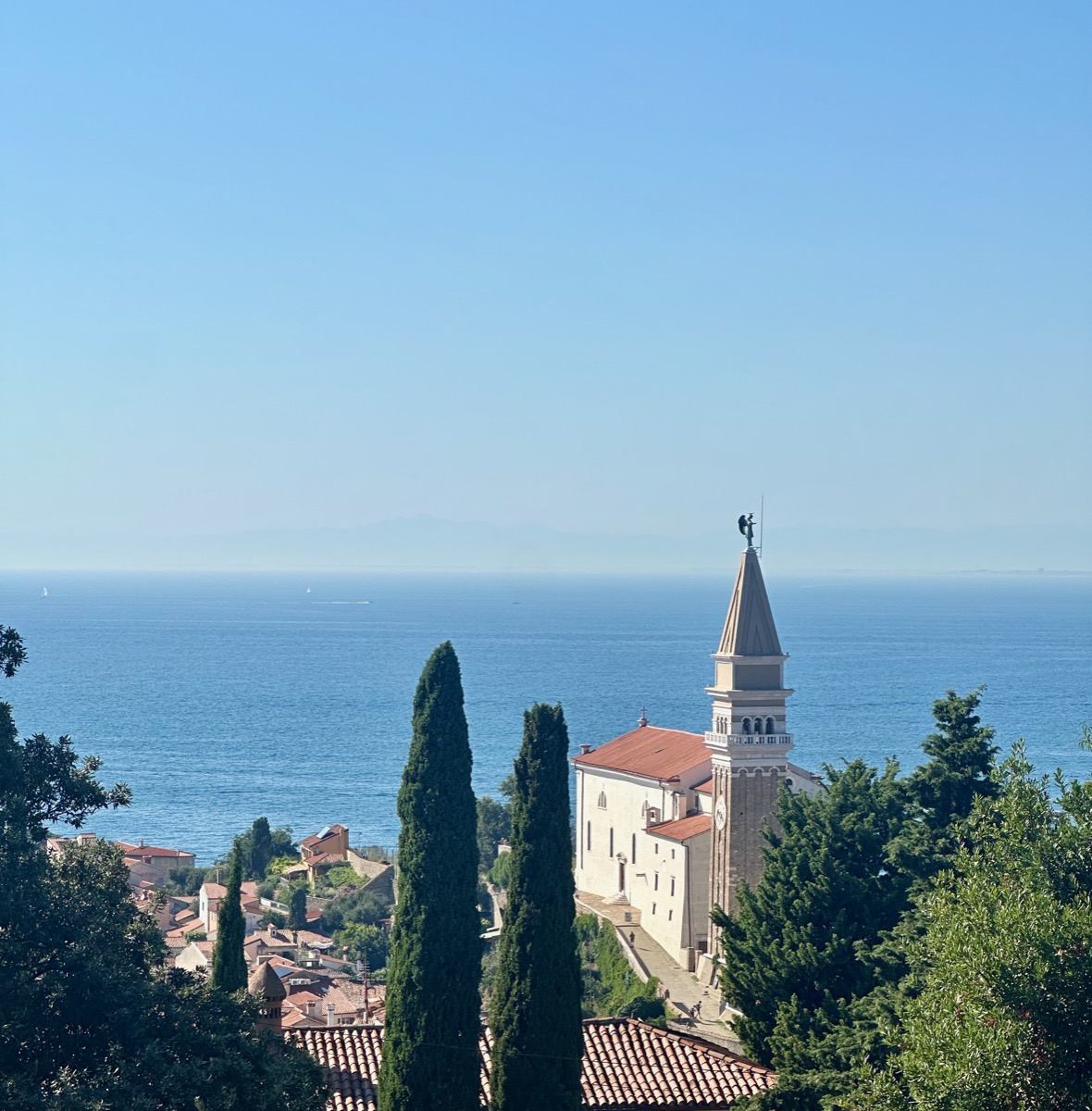 Portoroz's coastal charm shines with historic architecture against the Adriatic's serene backdrop.